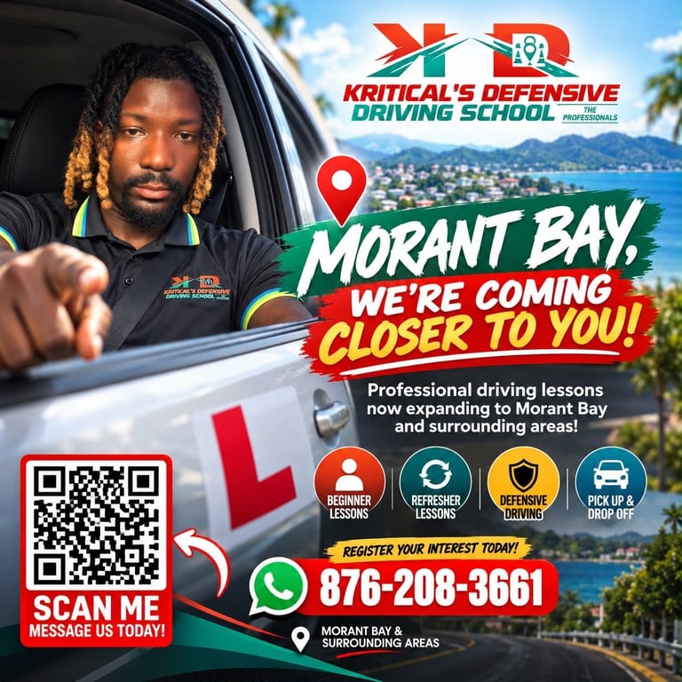 Instructor pointing from car window promoting Criticals Defensive Driving School expansion to Morant Bay with contact details